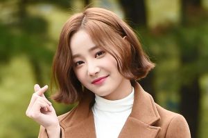 L'agence MOMOLAND révèle que Yeonwoo se remet d'un trouble panique